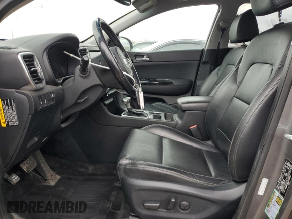 2018 Kia Sportage EX z VIN KNDPNCAC6J7384899, wystawiony jako Copart lot #53459515 z przebiegiem 49 229 mil mil oraz Szkoda całkowita • Salvage title. Historia ofert i sprzedaży dostępna na DreamBid. Obrazek 7.