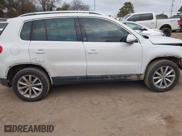 2017 Volkswagen Tiguan Wolfsburg Edition with VIN WVGRV7AX5HK019734, listed as a IAAI auction lot 41391911 with 123,005 mi miles and . Bid and sale history available at DreamBid. Image 13.
