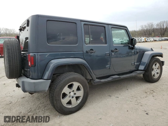2007 Jeep Wrangler Unlimited Sahara z VIN 1J4GB59147L165439, wystawiony jako Copart lot #50794065 z przebiegiem 255 385 mil mil oraz Szkoda całkowita • Salvage title. Historia ofert i sprzedaży dostępna na DreamBid. Obrazek 3.