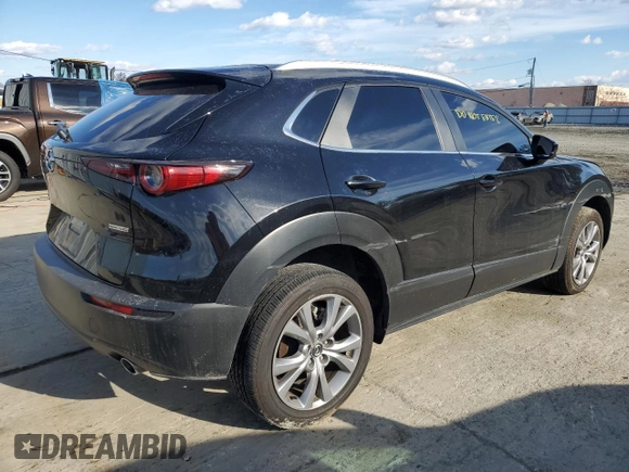 2023 Mazda CX-30 S Select with VIN 3MVDMBBMXPM568456, listed as a Copart auction lot 43131125 with Not Provided miles and Salvage Title. Bid and sale history available at DreamBid. Image 3.