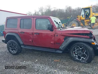 2021 Jeep Wrangler Unlimited Willys with VIN 1C4HJXDN8MW714976, listed as a IAAI auction lot 42080856 with 74,613 mi miles and . Bid and sale history available at DreamBid. Image 14.