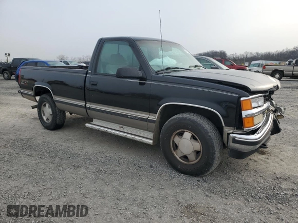 1998 Chevrolet Silverado 1500 with VIN 1GCEK14RXWZ236495, listed as a Copart auction lot 84159824 with 115,083 mi miles and Salvage Title. Bid and sale history available at DreamBid. Image 4.