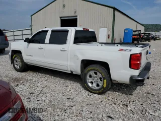 2015 Chevrolet Silverado 1500 LT with VIN 3GCUKREC2FG184493, listed as a Copart auction lot 52873115 with 174,704 mi miles and Salvage Title. Bid and sale history available at DreamBid. Image 2.