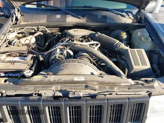 1998 Jeep Grand Cherokee Limited with VIN 1J4GX78Y8WC110325, listed as a IAAI auction lot 41357373 with 165,106 mi miles. Bid and sale history available at carsss.com. Image 10.
