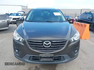 2016 Mazda CX-5 Grand Touring z VIN JM3KE4DY2G0684066, wystawiony jako IAAI lot #42078725 z przebiegiem 200 129 mil mil oraz . Historia ofert i sprzedaży dostępna na DreamBid. Obrazek 12.