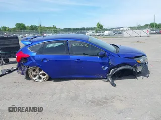 2014 Ford Focus ST z VIN 1FADP3L98EL154282, wystawiony jako IAAI lot #42290203 z przebiegiem 104 927 mil mil oraz . Historia ofert i sprzedaży dostępna na DreamBid. Obrazek 13.