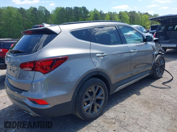 2017 Hyundai Santa Fe Ultimate z VIN 5NMZW4LA7HH047989, wystawiony jako IAAI lot #42051500 z przebiegiem 75 747 mil mil oraz . Historia ofert i sprzedaży dostępna na DreamBid. Obrazek 4.