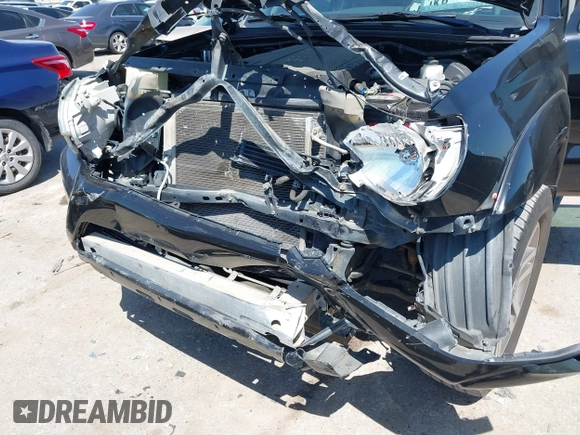 2014 Toyota Tacoma PreRunner with VIN 3TMJU4GN0EM160403, listed as a IAAI auction lot 41979894 with 169,941 mi miles. Bid and sale history available at carsss.com. Image 6.