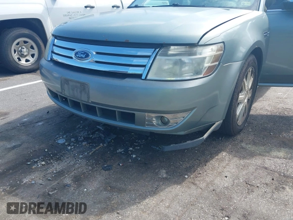 2008 Ford Taurus Limited z VIN 1FAHP25W28G115988, wystawiony jako IAAI lot #42726146 z przebiegiem 232 790 mil mil oraz . Historia ofert i sprzedaży dostępna na DreamBid. Obrazek 6.
