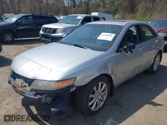 2006 Acura TSX with VIN JH4CL96826C012422, listed as a IAAI auction lot 42098806 with 186,706 mi miles and . Bid and sale history available at DreamBid. Image 2.