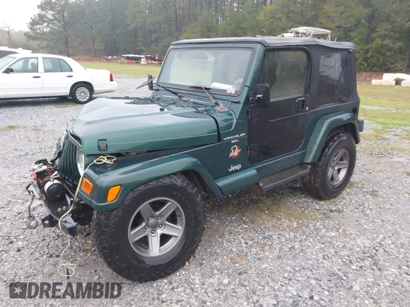 2000 Jeep Wrangler Sahara with VIN 1J4FA59SXYP701098, listed as a IAAI auction lot 41592872 with 1 mi miles. Bid and sale history available at carsss.com. Image 16.