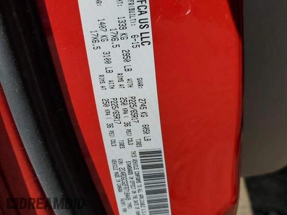 2015 Dodge Grand Caravan SXT with VIN 2C4RDGCG2FR718449, listed as a Copart auction lot 53922505 with 207,026 mi miles and Clean Title. Bid and sale history available at DreamBid. Image 13.