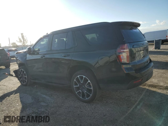 2023 Chevrolet Tahoe RST with VIN 1GNSCRKDXPR483465, listed as a Copart auction lot 77744604 with 11,078 mi miles and Salvage title. Bid and sale history available at DreamBid. Image 2.