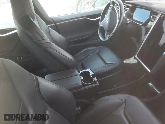 2014 Tesla Model S P85D with VIN 5YJSA1H28EFP62793, listed as a Copart auction lot 52902495 with Not Provided miles and Salvage Title. Bid and sale history available at DreamBid. Image 8.