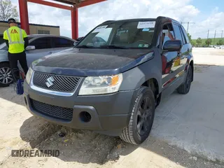 2006 Suzuki Grand Vitara Luxury z VIN JS3TD947664104590, wystawiony jako IAAI lot #42473110 z przebiegiem 146 715 mil mil oraz . Historia ofert i sprzedaży dostępna na DreamBid. Obrazek 2.