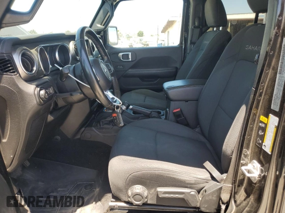 2020 Jeep Wrangler Unlimited Sahara with VIN 1C4HJXEN9LW247869, listed as a Copart auction lot 62697245 with 100,982 mi miles and Salvage title. Bid and sale history available at DreamBid. Image 7.