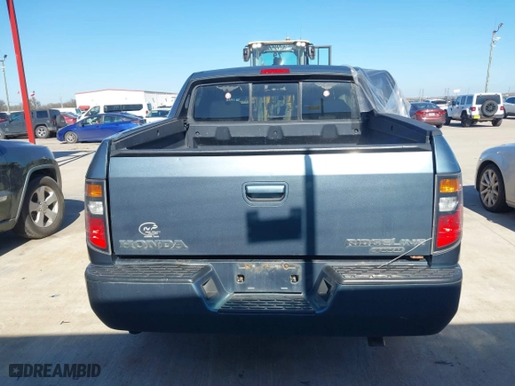 2006 Honda Ridgeline RTL with VIN 2HJYK16566H571367, listed as a IAAI auction lot 41342775 with 250,432 mi miles. Bid and sale history available at carsss.com. Image 16.