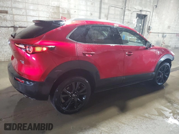 2021 Mazda CX-30 Premium Plus z VIN 3MVDMBEY9MM262293, wystawiony jako Copart lot #61369265 z przebiegiem 52 570 mil mil oraz Szkoda całkowita • Salvage title. Historia ofert i sprzedaży dostępna na DreamBid. Obrazek 3.