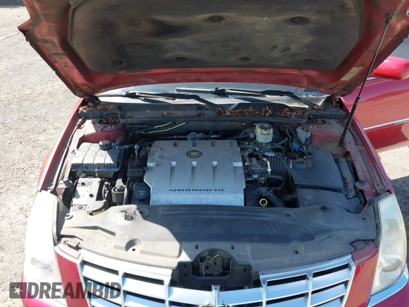 2006 Cadillac DTS 1SC z VIN 1G6KD57YX6U188066, wystawiony jako IAAI lot #42300335 z przebiegiem 110 774 mil mil oraz . Historia ofert i sprzedaży dostępna na DreamBid. Obrazek 10.