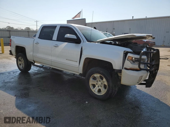 2018 Chevrolet Silverado 1500 LT with VIN 3GCUKREC0JG596842, listed as a Copart auction lot 47394105 with 135,583 mi miles and Salvage Title. Bid and sale history available at carsss.com. Image 4.