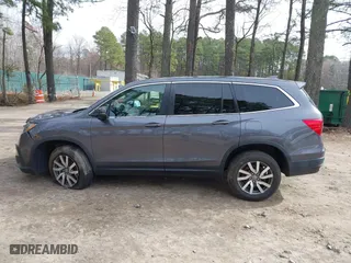 2022 Honda Pilot EX-L with VIN 5FNYF6H54NB009670, listed as a IAAI auction lot 41724302 with 32,690 mi miles. Bid and sale history available at carsss.com. Image 14.