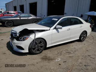 2014 Mercedes-Benz E 350 Sport z VIN WDDHF5KBXEA943629, wystawiony jako Copart lot #54801135 z przebiegiem 150 397 mil mil oraz Szkoda całkowita • Salvage title. Historia ofert i sprzedaży dostępna na DreamBid. Obrazek 1.