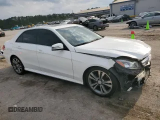 2014 Mercedes-Benz E 350 Sport with VIN WDDHF5KB9EA900559, listed as a Copart auction lot 51069705 with 137,278 mi miles and Salvage title. Bid and sale history available at DreamBid. Image 4.