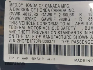 2023 Honda Civic Sedan EX with VIN 2HGFE1F70PH306371, listed as a IAAI auction lot 41811181 with 79,696 mi miles. Bid and sale history available at carsss.com. Image 7.