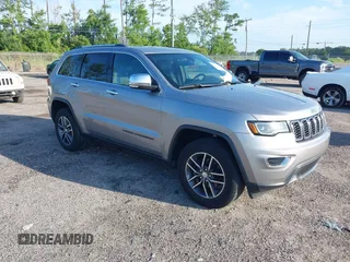 2018 Jeep Grand Cherokee Limited z VIN 1C4RJEBGXJC140875, wystawiony jako IAAI lot #42554007 z przebiegiem 123 823 mil mil oraz . Historia ofert i sprzedaży dostępna na DreamBid. Obrazek 1.