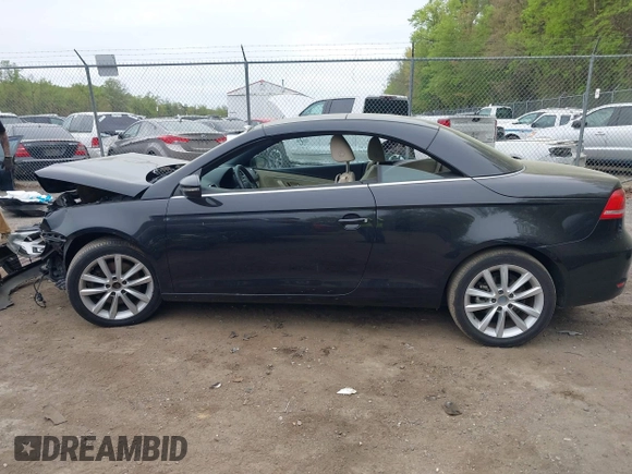 2014 Volkswagen Eos Komfort with VIN WVWBW8AH2EV001719, listed as a IAAI auction lot 42080290 with 105,661 mi miles and . Bid and sale history available at DreamBid. Image 14.