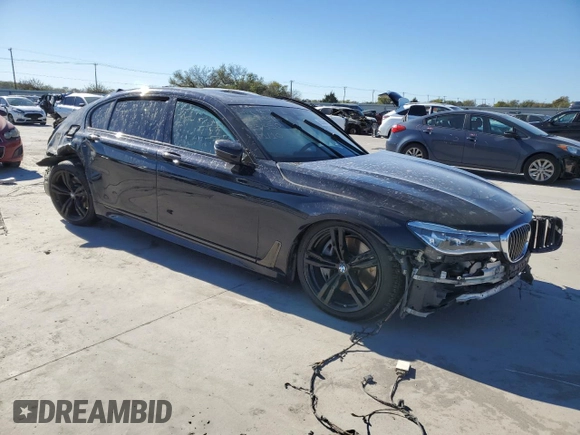 2018 BMW 7 Series 750i with VIN WBA7F0C50JGM23350, listed as a Copart auction lot 80530694 with 0 mi miles and Salvage Title. Bid and sale history available at carsss.com. Image 4.