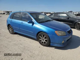 2005 Kia Spectra with VIN KNAFE161555082073, listed as a Copart auction lot 77062804 with 173,387 mi miles and Salvage Title. Bid and sale history available at carsss.com. Image 4.