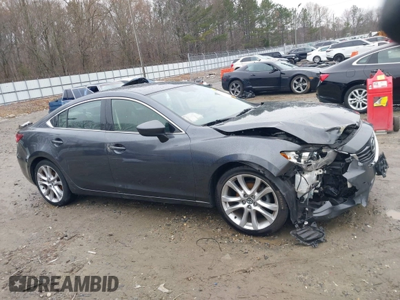 2016 Mazda Mazda6 i Touring with VIN JM1GJ1V56G1462637, listed as a IAAI auction lot 41603296 with 143,931 mi miles. Bid and sale history available at carsss.com. Image 13.