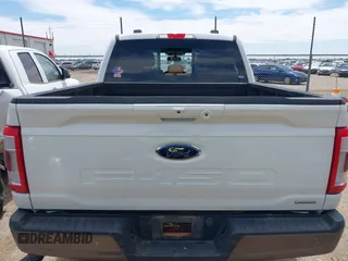 2021 Ford F-150 XL z VIN 1FTFW1E82MFA28107, wystawiony jako IAAI lot #42150129 z przebiegiem 74 496 mil mil oraz . Historia ofert i sprzedaży dostępna na DreamBid. Obrazek 16.