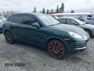 2012 Porsche Cayenne S Hybrid z VIN WP1AE2A20CLA92813, wystawiony jako IAAI lot #41916936 z przebiegiem 145 503 mil mil oraz . Historia ofert i sprzedaży dostępna na DreamBid. Obrazek 1.