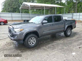 2018 Toyota Tacoma SR5 z VIN 5TFAZ5CN3JX071474, wystawiony jako Copart lot #54677335 z przebiegiem 86 866 mil mil oraz Szkoda całkowita • Salvage title. Historia ofert i sprzedaży dostępna na DreamBid. Obrazek 1.