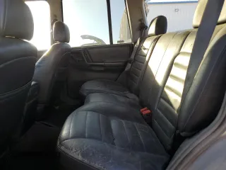 1998 Jeep Grand Cherokee with VIN 1J4FX48S4WC345469, listed as a Copart auction lot 80721224 with 201,543 mi miles and Salvage title. Bid and sale history available at DreamBid. Image 11.