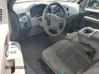 2005 Ford F-150 XL with VIN 1FTVF12585NA40842, listed as a Copart auction lot 61728465 with 288,002 mi miles and Salvage title. Bid and sale history available at DreamBid. Image 8.
