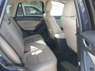 2014 Mazda CX-5 Grand Touring with VIN JM3KE2DY7E0376389, listed as a IAAI auction lot 42014946 with 126,081 mi miles. Bid and sale history available at carsss.com. Image 8.