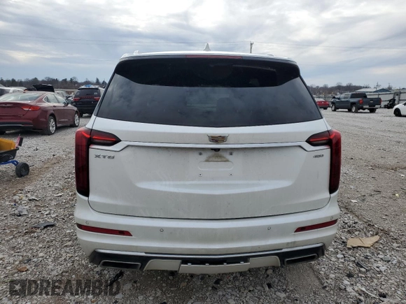 2021 Cadillac XT6 Premium Luxury z VIN 1GYKPCRS0MZ116319, wystawiony jako Copart lot #44315055 z przebiegiem 61 105 mil mil oraz Szkoda całkowita • Salvage title. Historia ofert i sprzedaży dostępna na DreamBid. Obrazek 6.