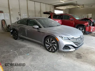 2021 Volkswagen Arteon SEL R-Line с VIN WVWHR7ANXME004450, выставлен на аукционе Copart как лот 62593443 с пробегом 8 900 миль миль и . История ставок и продаж доступна на DreamBid. Изображение 4.