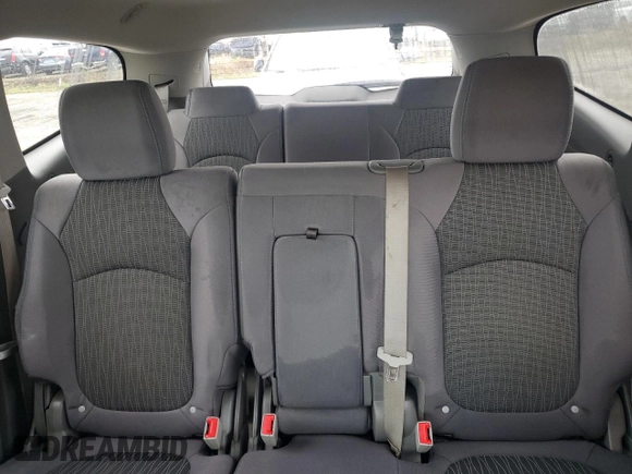 2015 Chevrolet Traverse LS z VIN 1GNKRFED6FJ113457, wystawiony jako Copart lot #74671954 z przebiegiem Nie podano mil oraz Szkoda całkowita • Salvage title. Historia ofert i sprzedaży dostępna na DreamBid. Obrazek 10.
