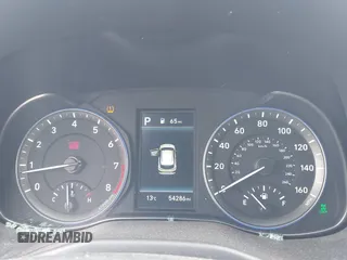 2021 Hyundai Kona SE z VIN KM8K1CAA3MU745706, wystawiony jako IAAI lot #41663139 z przebiegiem 54 286 mil mil oraz . Historia ofert i sprzedaży dostępna na DreamBid. Obrazek 7.