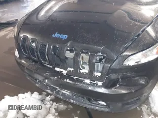 2015 Jeep Cherokee Sport with VIN 1C4PJMAB6FW773953, listed as a IAAI auction lot 41565879 with 242,580 mi miles. Bid and sale history available at carsss.com. Image 6.
