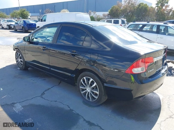 2010 Honda Civic Sdn LX with VIN 2HGFA1F55AH302155, listed as a IAAI auction lot 41799279 with 122,638 mi miles. Bid and sale history available at carsss.com. Image 3.
