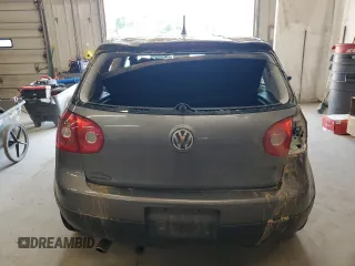 2009 Volkswagen Rabbit S with VIN WVWAB71K29W124868, listed as a Copart auction lot 62224655 with 142,262 mi miles and Salvage title. Bid and sale history available at DreamBid. Image 6.