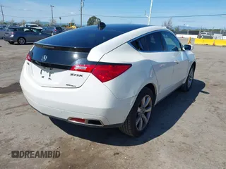 2012 Acura ZDX Tech Pkg with VIN 2HNYB1H42CH500312, listed as a IAAI auction lot 41841597 with 166,879 mi miles. Bid and sale history available at carsss.com. Image 4.