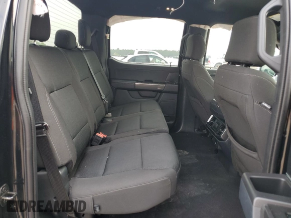 2023 Ford F-150 XL with VIN 1FTEW1C59PFC27499, listed as a Copart auction lot 54453255 with 58,554 mi miles and Salvage title. Bid and sale history available at DreamBid. Image 10.