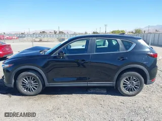 2017 Mazda CX-5 Sport with VIN JM3KFBBL2H0144792, listed as a IAAI auction lot 41654031 with 77,107 mi miles. Bid and sale history available at carsss.com. Image 14.