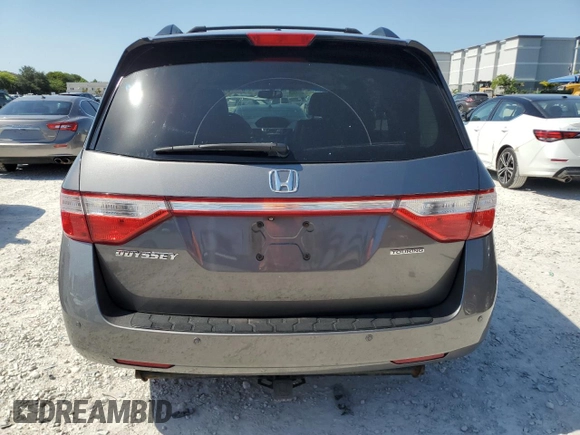 2011 Honda Odyssey Touring with VIN 5FNRL5H97BB501213, listed as a Copart auction lot 57314115 with 283,538 mi miles and Salvage title. Bid and sale history available at DreamBid. Image 6.
